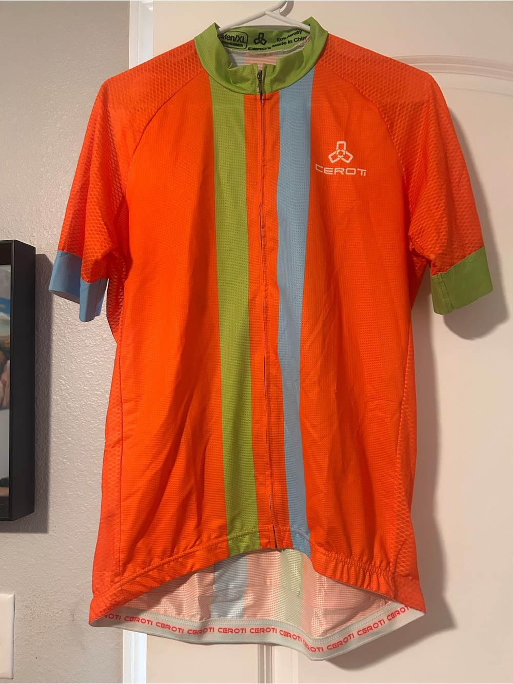 Ceroti Bright Orange Cycling Jersey with Blue & Green Stripe. Men’s XL